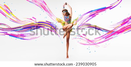 hot dancing woman in colourful necklace and lines in studio