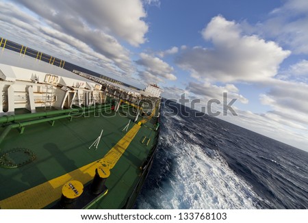 Cargo ship underway viewed from forecastle