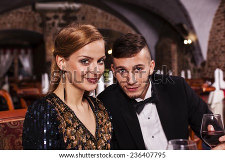 Couple eating dinner at restaurant