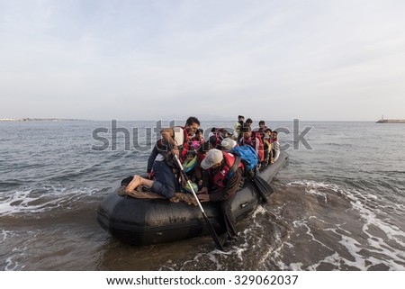 Kos, Greece - October 17, 2015: Migrants are coming from Turkey to the Kos island on a dinghy boat.