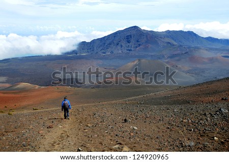 Boy hiking on the top of Haleakala Volcano in the Island of Maui, Hawaii.
