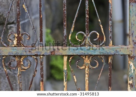 A rusty gate leading to a small garden in Sasebo, Japan (http://www.artistovision.com/outdoors/rusty-gate.html).