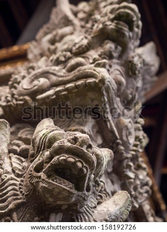 Statues and carvings depicting demons, gods and Balinese mythological deities can be found throughout the Pura Dalem Agung Padangtegal temple in the Monkey Forest Sanctuary in Ubud, Bali.