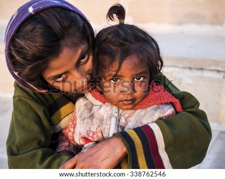 Pushkar, Rajasthan, India - January 23: Unidentified poor Indian street children in Pushkar, Rajasthan, India.