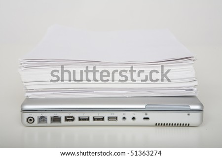 Laptop computer and paper