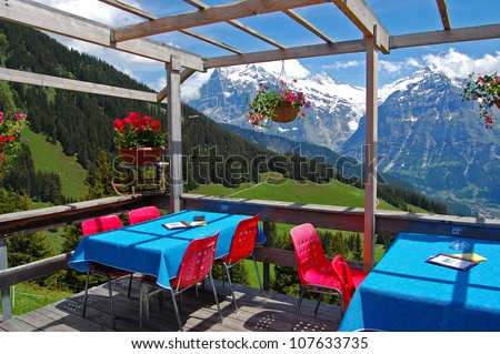Mountain restaurant with magnificent view in Swiss Alps, Grindelwald, Switzerland