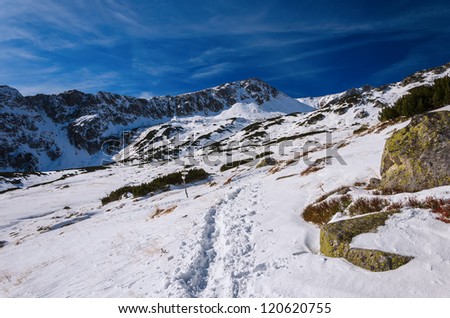 Path in snow in 5 lakes valley in winter, High Tatra Mountains, Poland