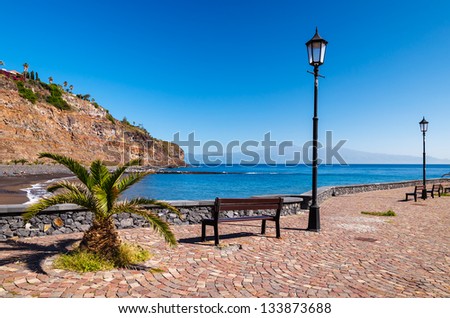 Seaside promenade palm trees ocean view, San Sebastian, La Gomera island, Spain