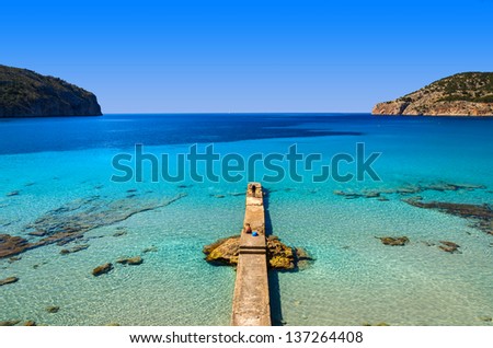 Jetty sea horizon beach bay mountains, Camp de Mar, Majorca island, Spain
