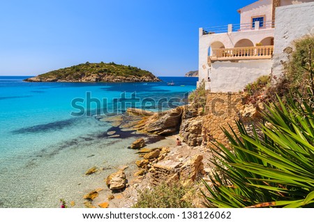 Beautiful beach turquoise sea water white holiday house, Sant Elm, Mallorca island, Spain