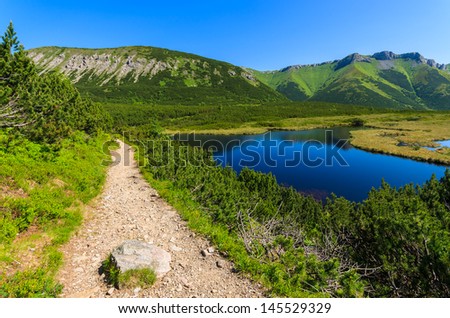 Trail path summer landscape lake, Kezmarska valley, Tatry Mountains, Slovakia
