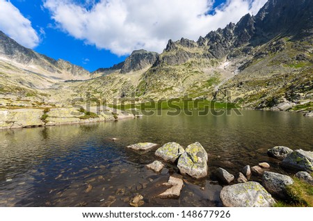 Mountain alpine valley lake view, 5 lakes valley (Piat Spisskich Ples), High Tatras, Slovakia
