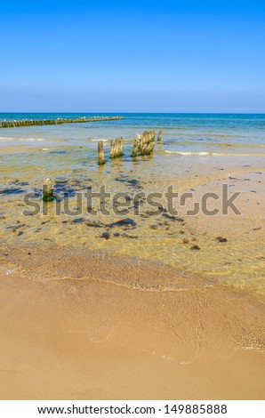 Sand beach wave breakers sea view horizon blue sky, Ustka, Baltic Sea, Poland
