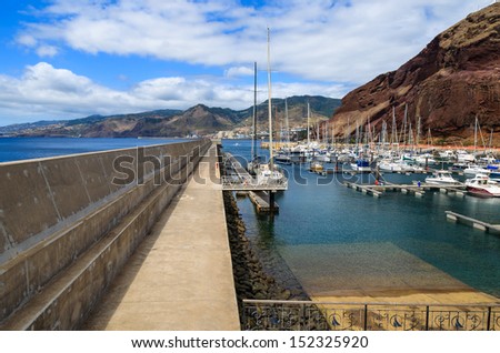 Marina with boats and yachts with mountain view, Madeira island, Portugal