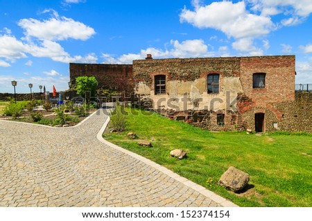 Restaurant building built from stones in a park of an old medieval castle in Gussing town, Burgenland, Austria