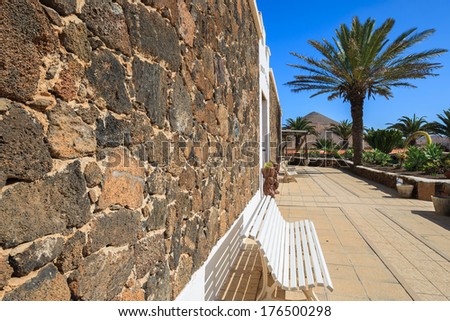 Canary style buildings and tropical plants in La Oliva village Heritage Art Center, Fuerteventura, Canary Islands, Spain