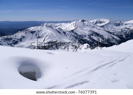 Snow hole on dangerous mountain trail in West Tatras