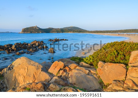 Rocks in beautiful sunrise light on Porto Giunco beach near Villasimius, Sardinia island, Italy