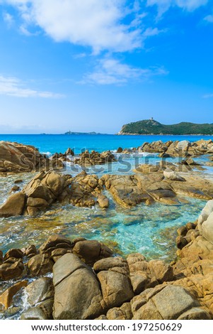 Rocks on Porto Giunco beach and crystal clear turquoise sea water, Sardinia island, Italy