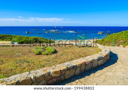 Path to beach on coast of Cala Caterina bay, Sardinia island, Italy