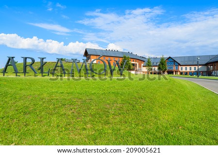 ARLAMOW HOTEL, POLAND - AUG 3, 2014: green grass lawn in beautiful Arlamow Hotel on sunny summer day. This luxury resort was owned by Poland\'s government and is located in Bieszczady Mountains.