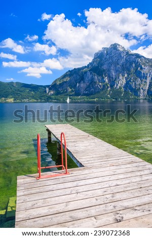 Wooden jetty for mooring yachts and boats on mountain lake, Gmunden, Traunsee, Upper Austria