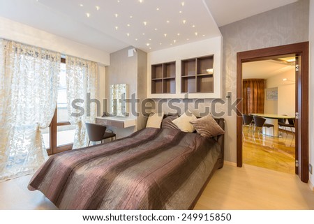 Interior design: modern bedroom in luxury apartment in Krakow city, Poland