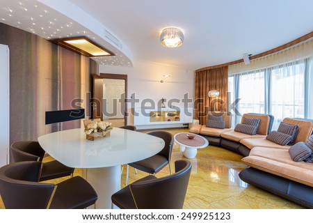 Modern living room interior with marble floor in luxury apartment, Krakow city, Poland
