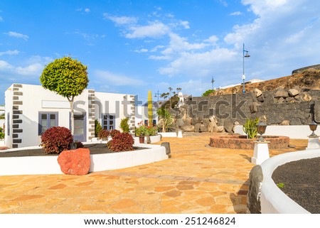 Typical Canary style houses on square in marina Rubicon, Playa Blanca, Lanzarote island, Spain