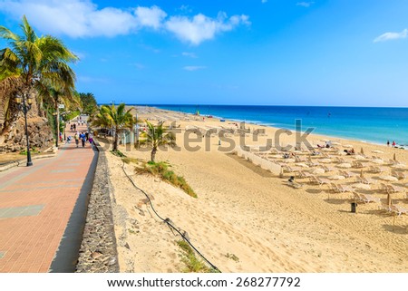 Coastal promenade along sandy beach in Morro Jable town, Fuerteventura, Canary Islands, Spain