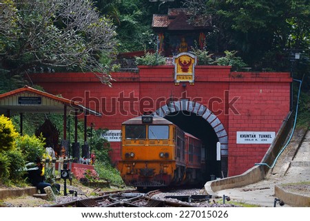 Lampang, Thailand-October 17: Trains are running through the Khun Tan Tunnel at Khun Tan Railway Station in  Lampang, Thailand on October 17, 2014