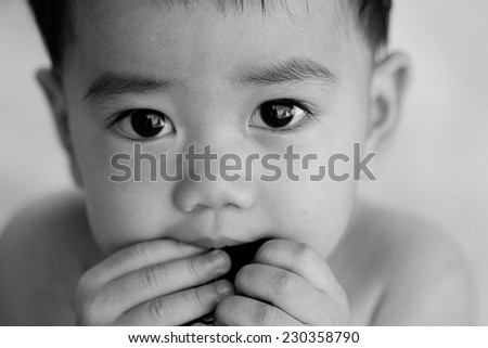 looked asian baby Black and white, close-up