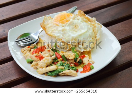 Thailand food, Basil fried chicken and fried egg, Kapoa Kai and fried egg are the popular menu of Thai