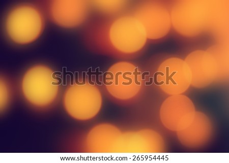 Bokeh beautiful yellow light in the darkness, blurred background
