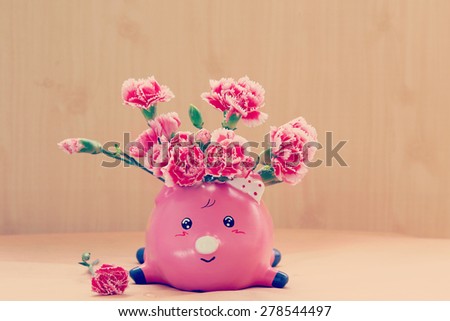 still life flowers, Carnation flowers in pink pig vase