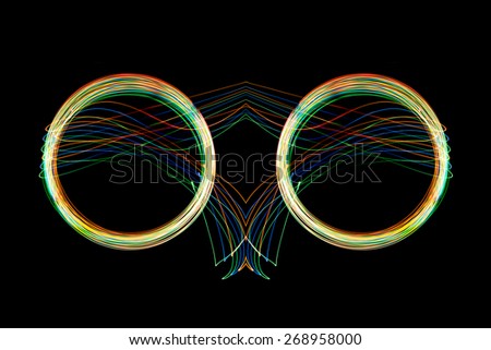 Abstract long exposure neon lights cycle texture soft focut.