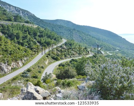 Landscape in spring with roads with hairpin bends at the island Vis in Croatia