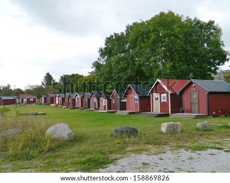 Red painted fisherman houses in the fishermen harbour of Slite on the island Gotland in Sweden