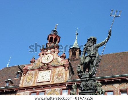 The sculpture of Neptune, the roman god of the sea,  in front of the city hall of Tuebingen in Germany