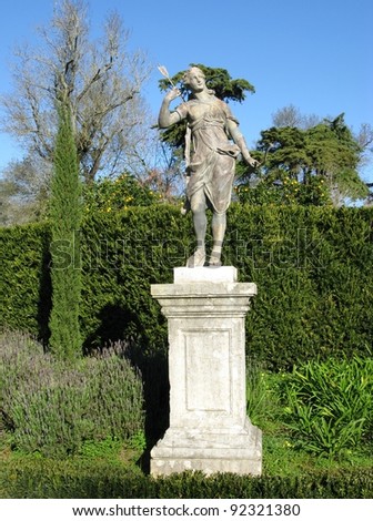 A bronze statue in the garden of the Queluz palace in Portugal