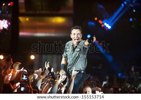 RIO DE JANEIRO, BRAZIL - SEPTEMBER 21: US singer Bruce Springsteen performs among the audience during the Rock in Rio 2013 concert , on September 21, 2013, in Rio de Janeiro, Brazil.
