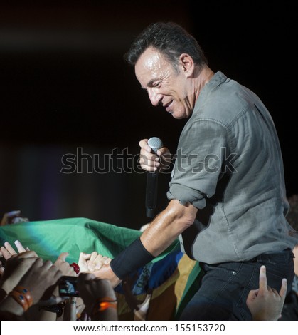 RIO DE JANEIRO, BRAZIL - SEPTEMBER  21:  US singer Bruce Springsteen performs among the audience during the Rock in Rio 2013 concert ,  on September 21, 2013, in Rio de Janeiro, Brazil.