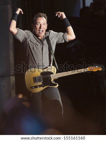 RIO DE JANEIRO, BRAZIL - SEPTEMBER  21:  US singer Bruce Springsteen performs among the audience during the Rock in Rio 2013 concert ,  on September 21, 2013, in Rio de Janeiro, Brazil.