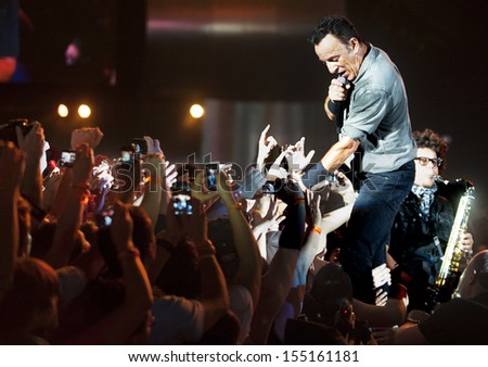 Rio De Janeiro, Brazil - September 21: Us Singer Bruce Springsteen Performs Among The Audience During The Rock In Rio 2013 Concert , On September 21, 2013, In Rio De Janeiro, Brazil.