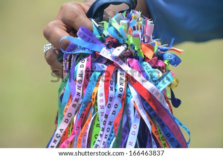 BAHIA, BRAZIL: DECEMBER 8: Fitas do Senhor do Bonfim (wish ribbons), are the most well known souvenir sold on the streets of Salvador , on December 08, 2013 in Salvador, Brazil.