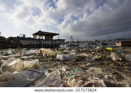 Rio de Janeiro March 02,2015- Pollution on Guanabara bay. plastic bags and bottles near a fishing boats on the Guanabara bay, where the 2016 Olympic Summer Games sailing competitions will be held.
