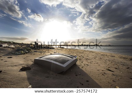 Rio de Janeiro March 02, 2015- Pollution at the Guanabara bay. A broken TV screen is see  in a beach on the Guanabara bay, where the 2016 Olympic Summer Games sailing competitions will be held.