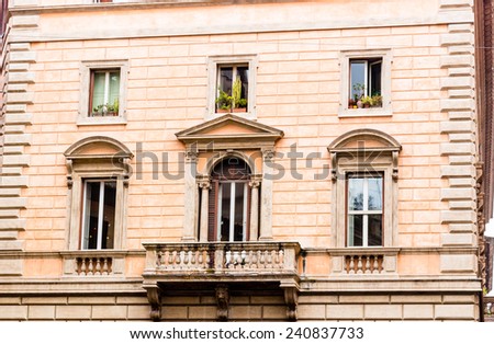 Windows of historical building in the center of Rome