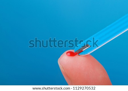 Blood test from a finger to a close-up diabetes. Diabetes concept