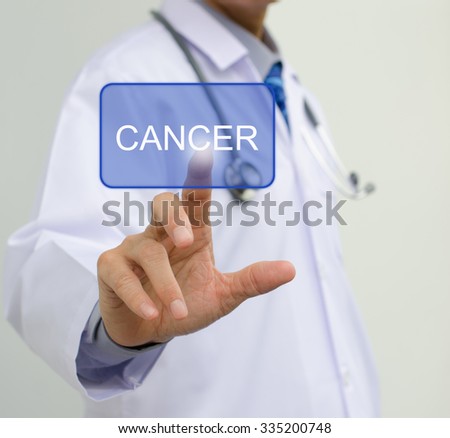 Doctor in white gown touching cancer button on  virtual screen